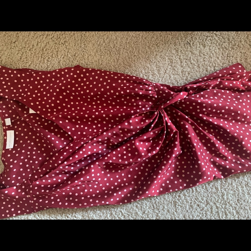 Crimson red Polk a dot shirt.